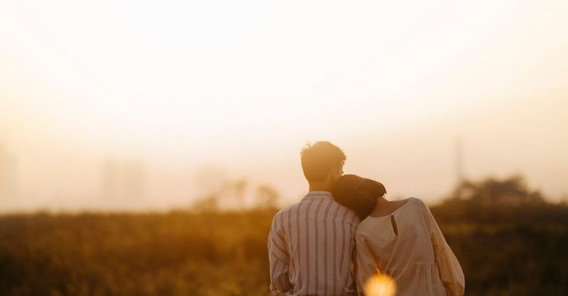 Relationships - Man and Woman Near Grass Field
