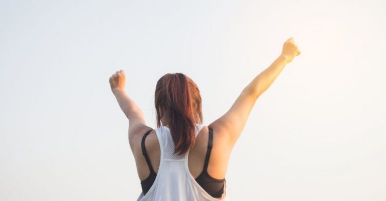 Wellness - Woman Wearing Black Bra and White Tank Top Raising Both Hands on Top